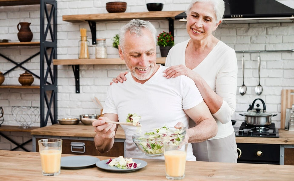 Education-and-training-industry Happy senior couple preparing a healthy meal together. Education and training industry.