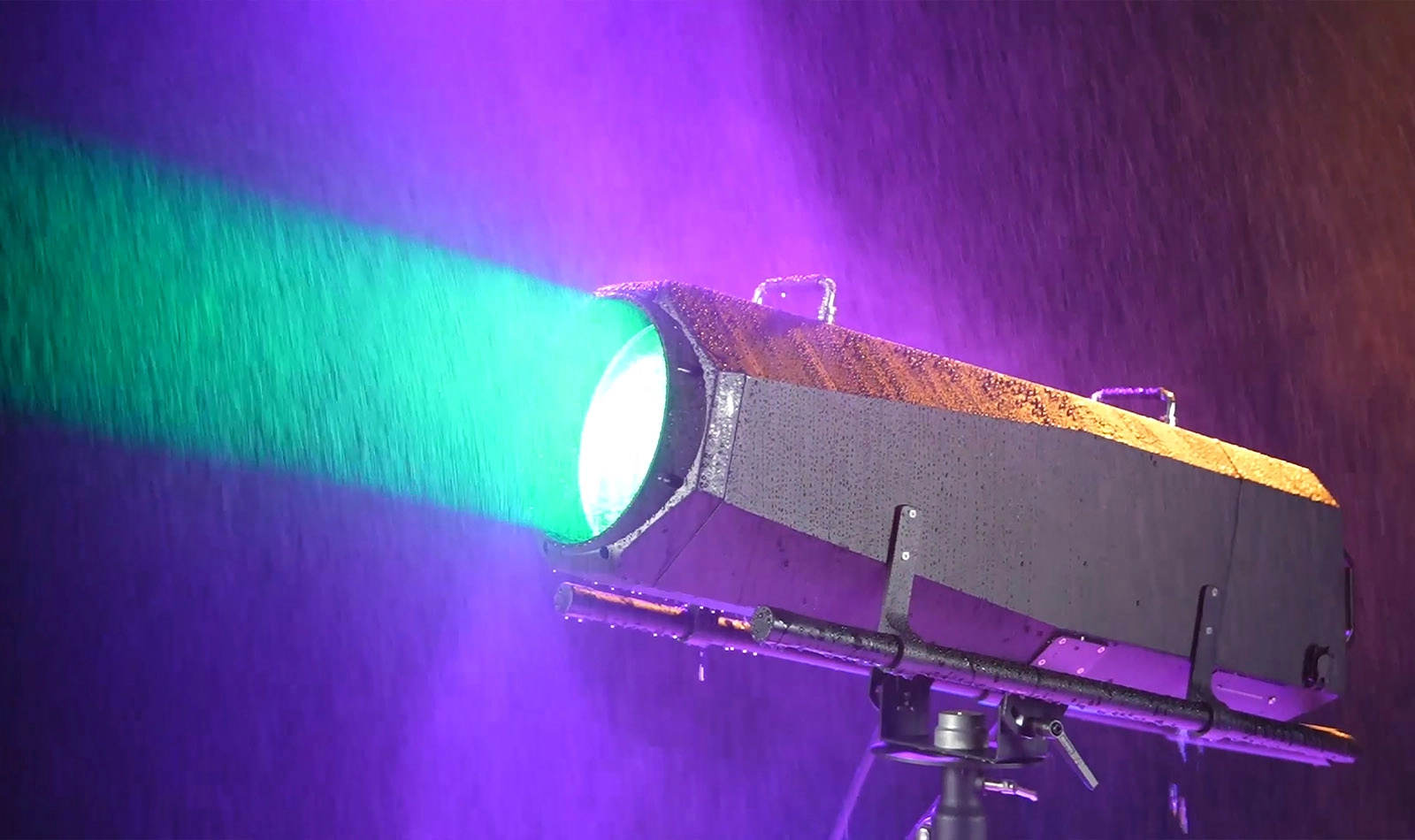 1200W IP54 LED Follow Spot Light green beam effect in outdoor rain environment - Colorful Light
