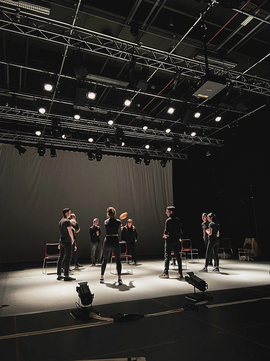 Theater stage lighting setup with overhead fixtures for performing arts - Colorful Light