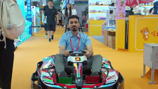 a man is driving go karts