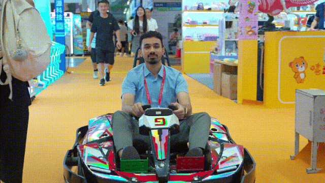 a man is driving go karts a man is driving go karts