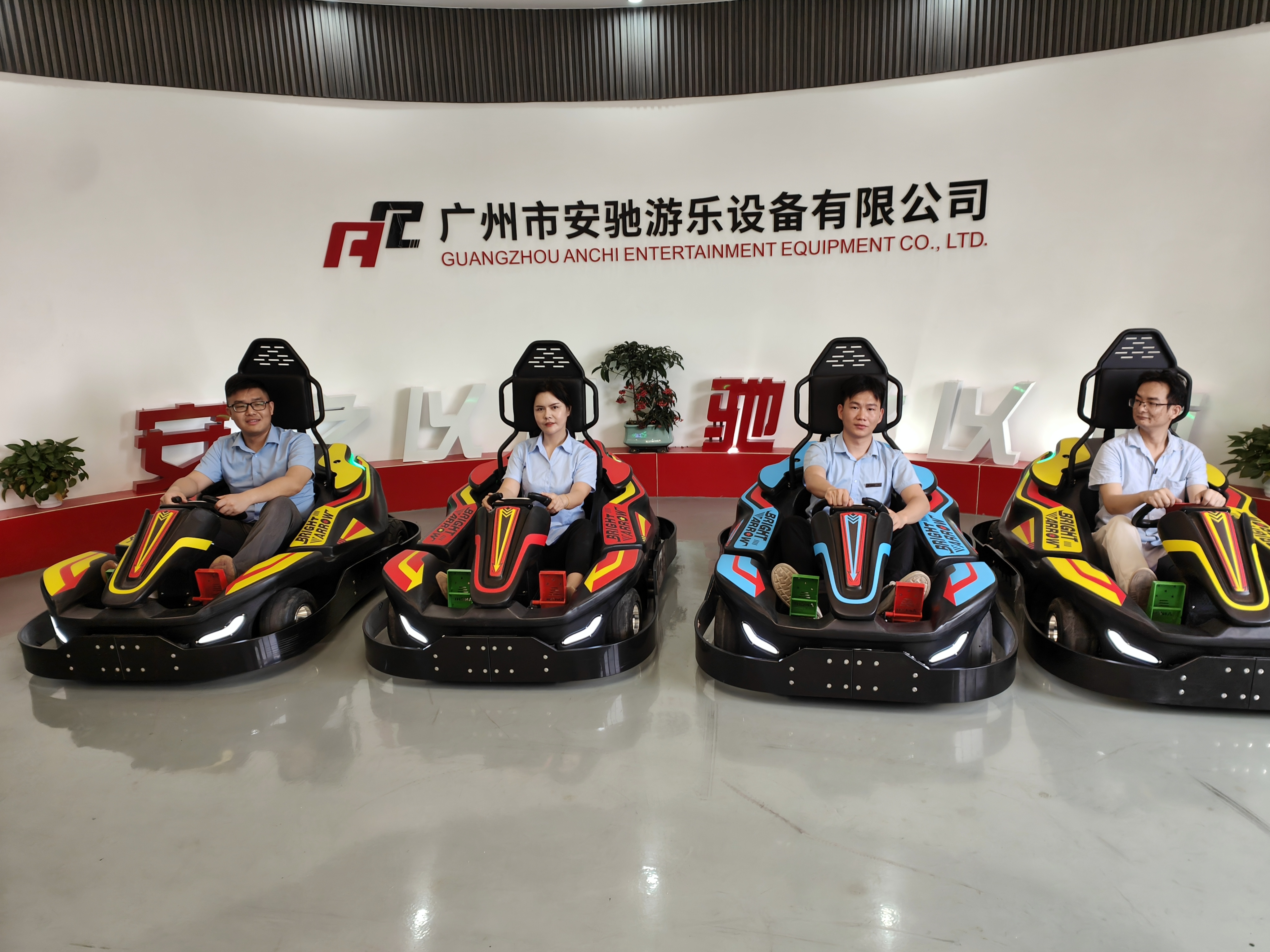 people are driving go karts