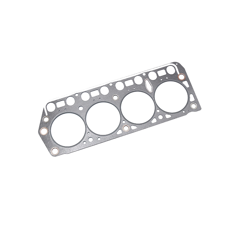 Engine head gasket with four cylinder openings.