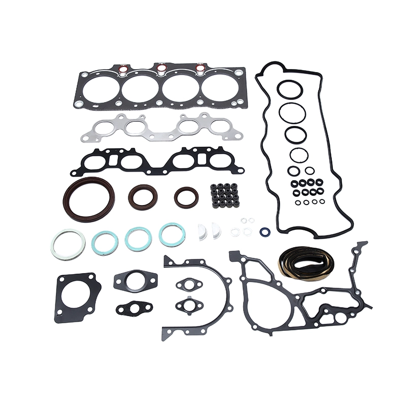 A complete engine gasket set laid out on a white background.