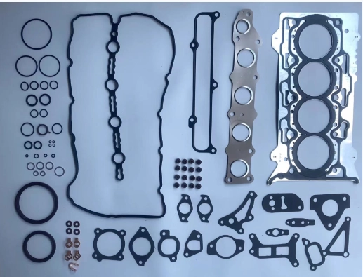 A collection of various engine gaskets and O-rings arranged on a light grey background.