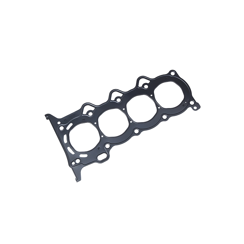 Black four-cylinder engine head gasket.