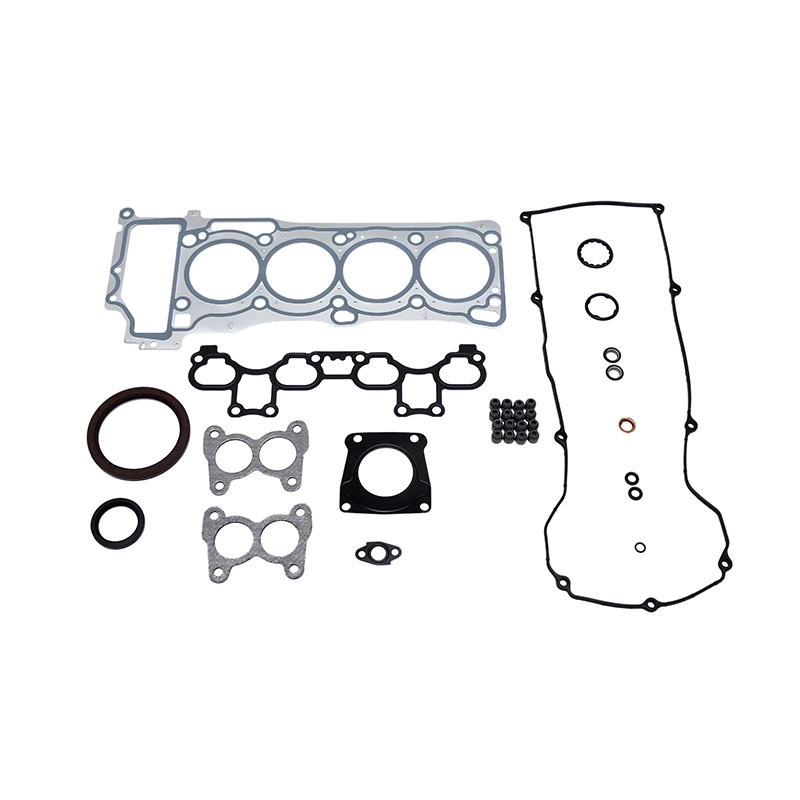A complete engine gasket set laid out on a white background.