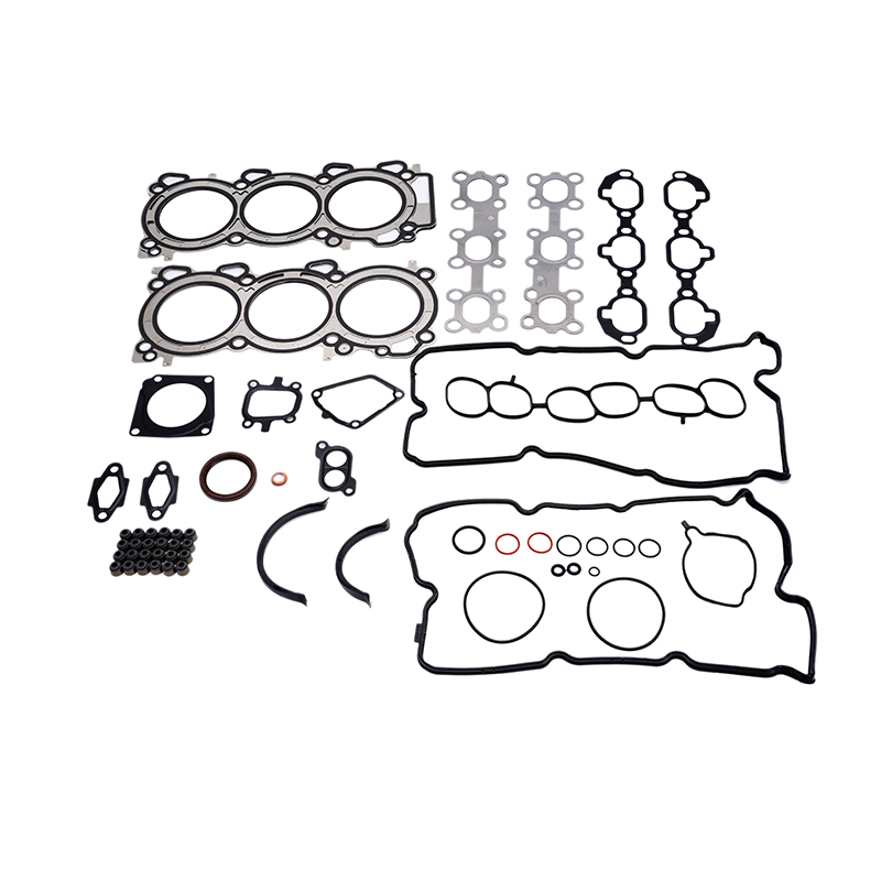 A complete engine gasket set laid out on a white background.