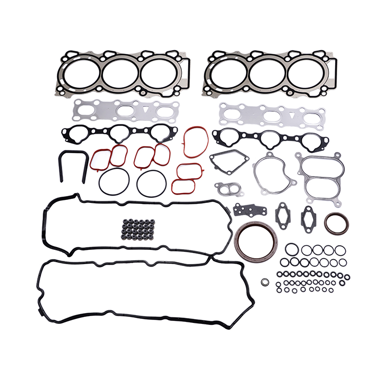 A complete engine gasket and seal kit, featuring head gaskets, valve cover gaskets, exhaust manifold gaskets, intake manifold gaskets, oil pan gaskets, and numerous smaller seals and o-rings, neatly arranged against a white background.