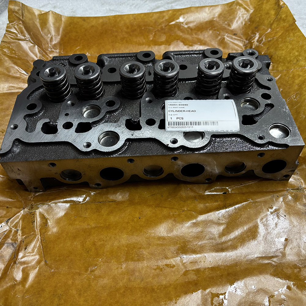 Kubota engine cylinder head 1A051-03040 side view showing intake and exhaust ports