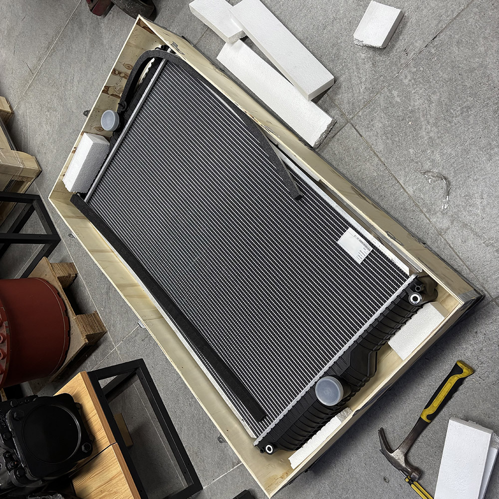 Radiator replacement for CAT 966H wheel loader