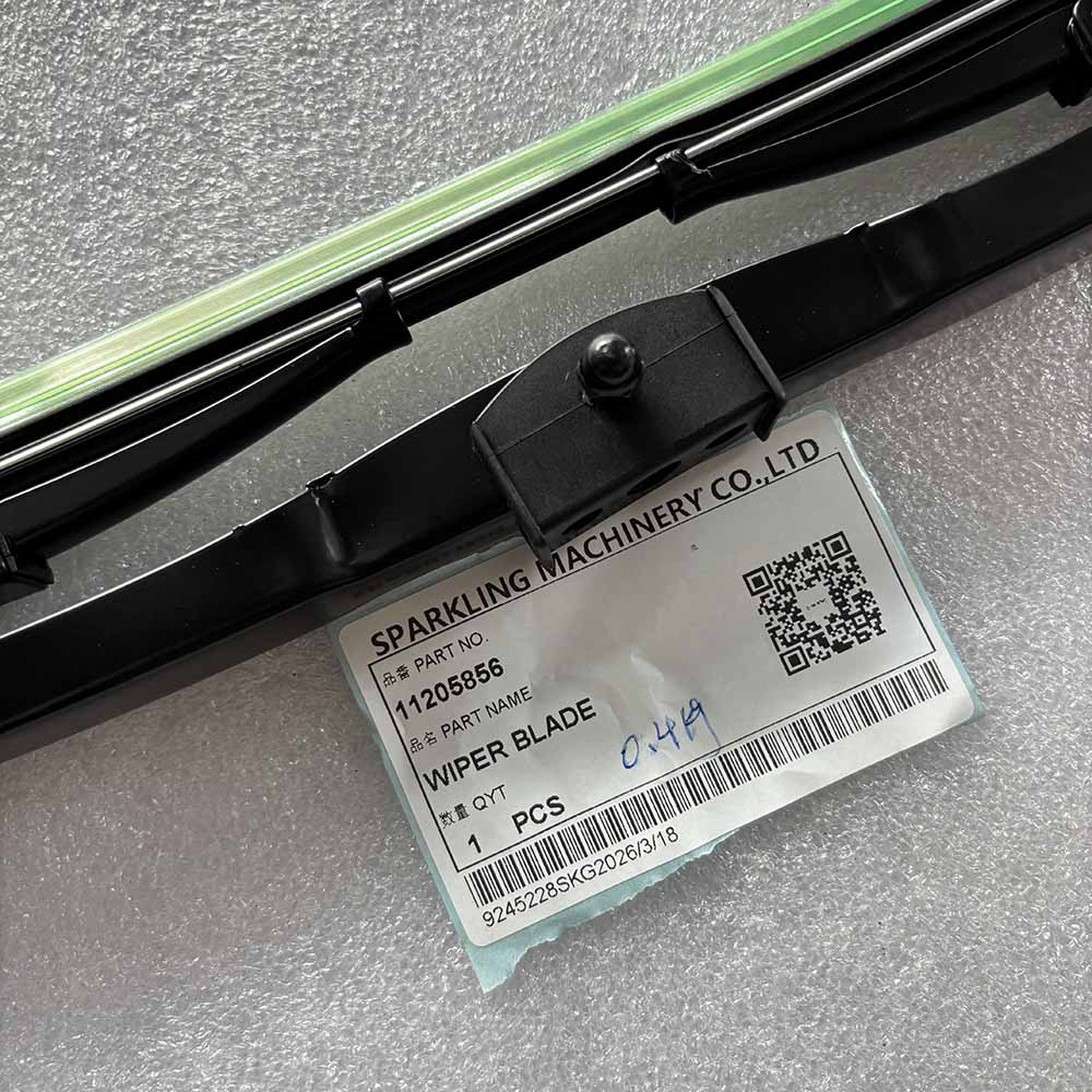Black windshield 11205856 wiper blade with a product label on a textured surface
