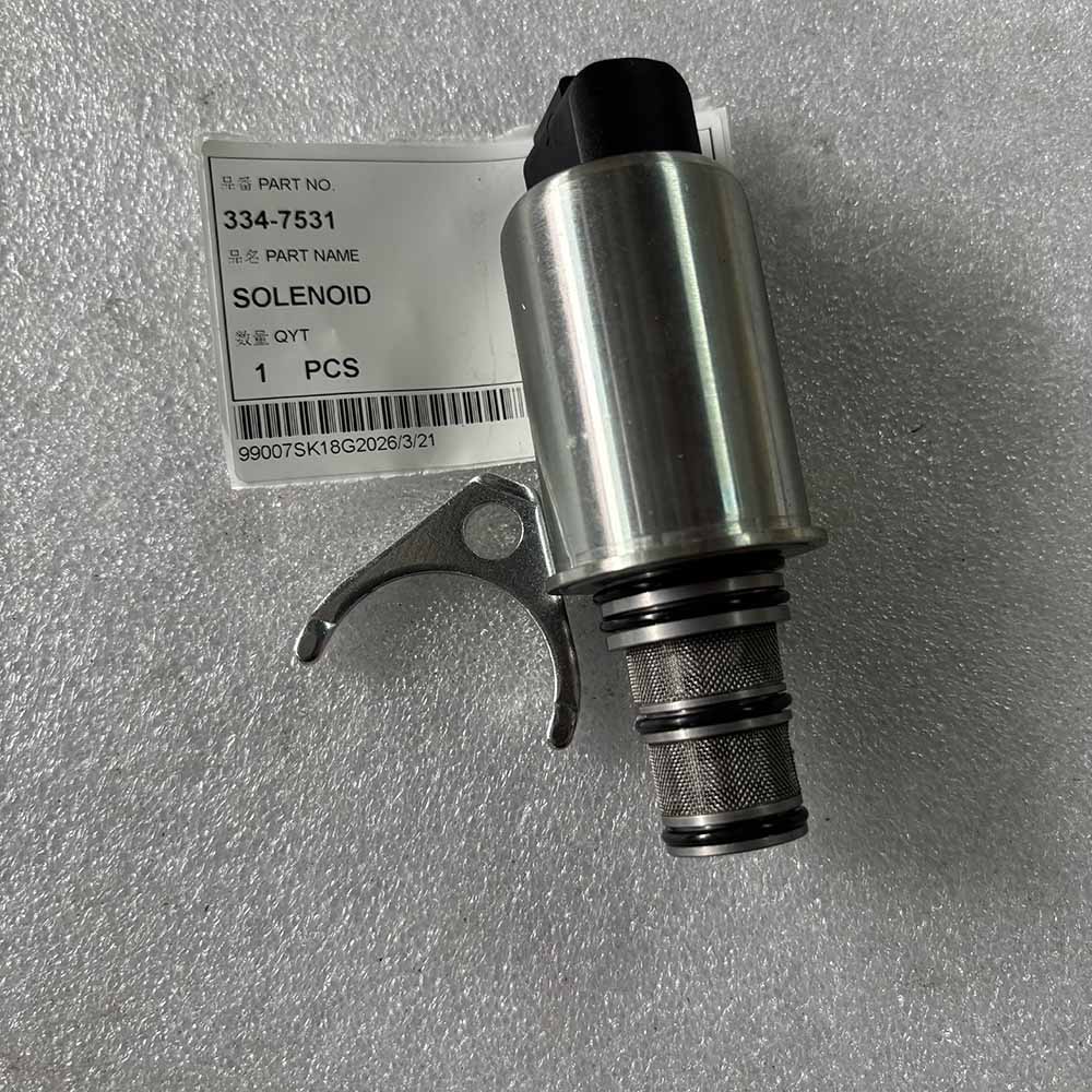 334-7531 Solenoid valve part with label on a textured surface.