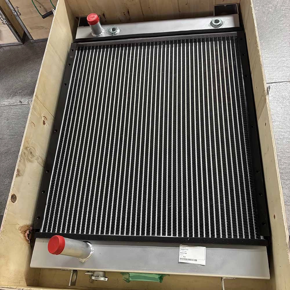 1340371112-Komatsu-replacement-radiator-core-view-showing-inlet-outlet