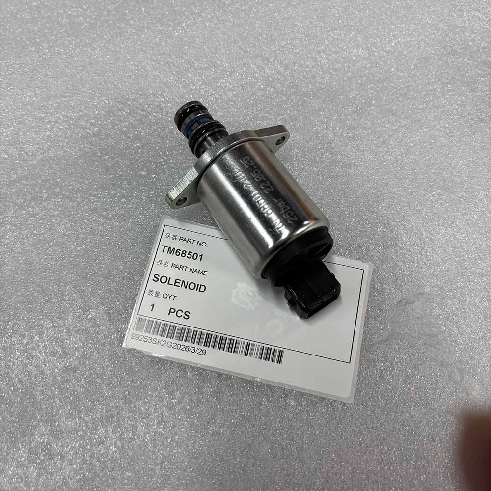 TM68501 Solenoid Valve 24VDC 25Bar for Heavy Machinery Metal solenoid valve part TM68501 with product label on a white surface.