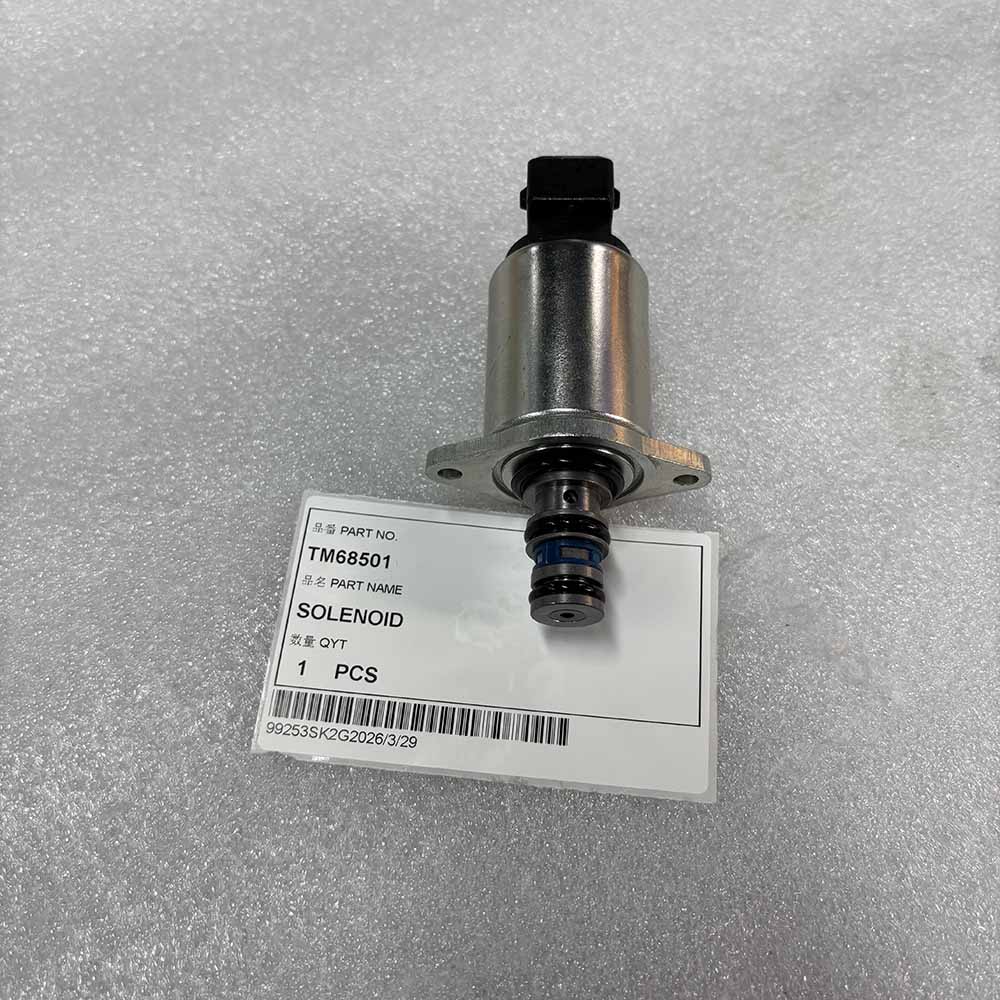 TM68501 Solenoid Valve 24VDC 25Bar for Heavy Machinery Metal solenoid valve part TM68501 with product label on foam background.