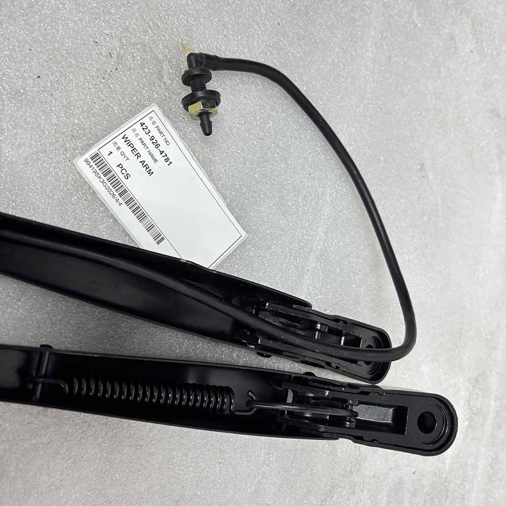 Black metal 423-926-4781 wiper arm with nozzle and part label.