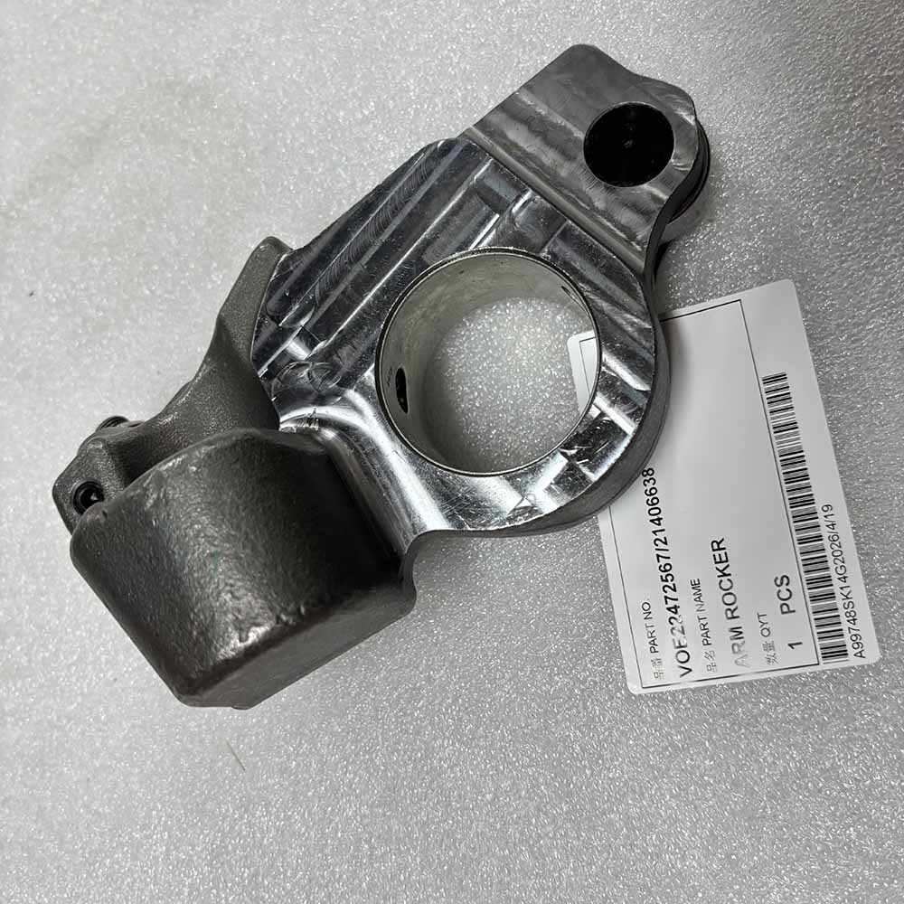 Industrial metal arm rocker engine part with labeled identification tag VOE22472567/21406638