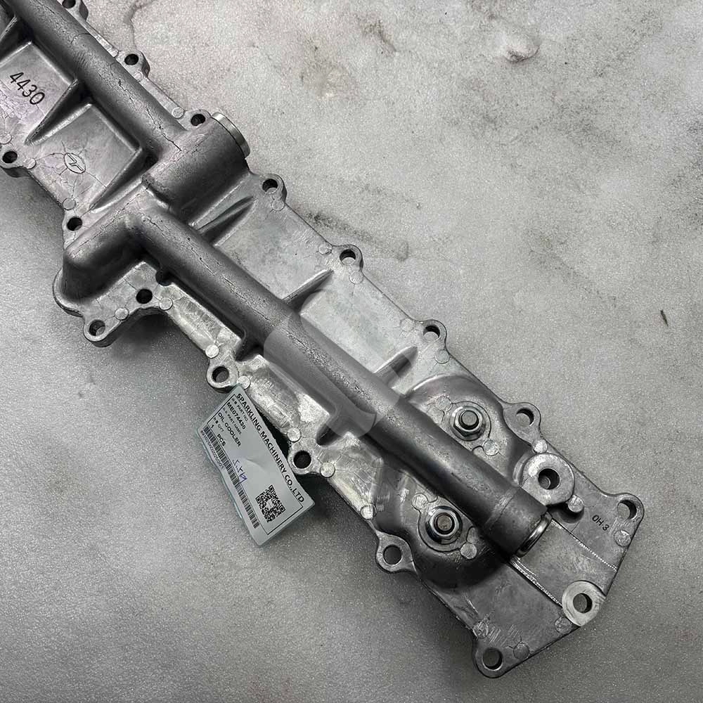5.5Kg ME074430 Oil Cooler for Mitsubishi 6D16, S6R, S12R Engines Mitsubishi ME074430 5.5Kg Oil Cooler for 6D16, S6R, and S12R Engines – High-Quality OEM Part