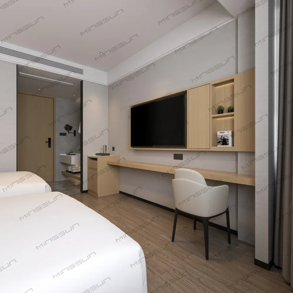 Hotel-room-interior-featuring-two-beds,-a-desk-with-chair,-and-a-large-flatscreen-TV. - MINGSUN Hotel room interior featuring two beds, a desk with chair, and a large flatscreen TV. - MINGSUN
