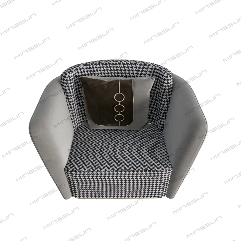 Overhead view of a grey and houndstooth patterned armchair with a decorative pillow. - MINGSUN Overhead view of a grey and houndstooth patterned armchair with a decorative pillow. - MINGSUN
