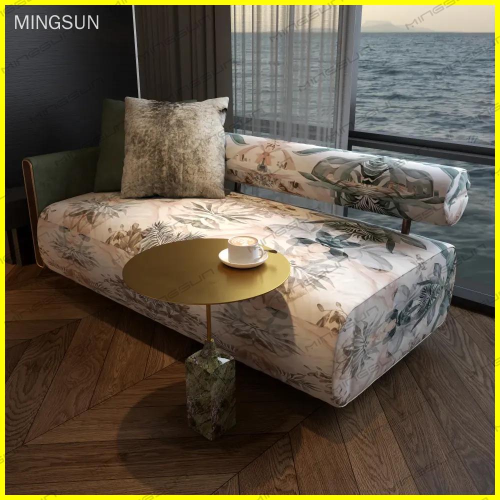 boutique-hotel-suite-chaise-lounge-side-table-scene-with-tropical-pattern-upholstery - MINGSUN