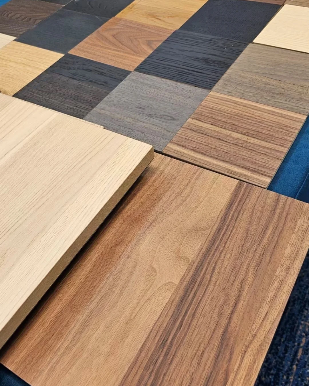 close-up-of-multi-tone-wood-grain-laminate-samples-in-checkerboard-layout-for-hotels