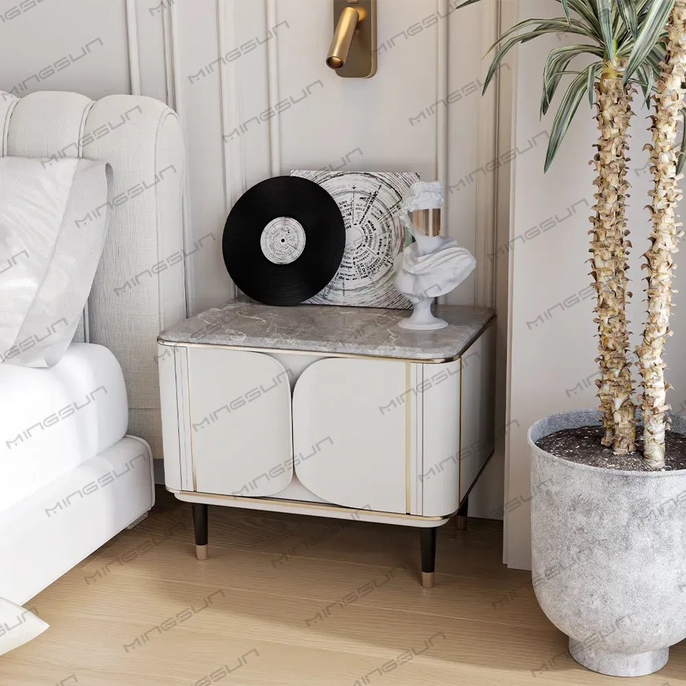 contemporary-hotel-nightstand-placed-beside-bed-with-decorative-items-and-wall-lamp - MINGSUN