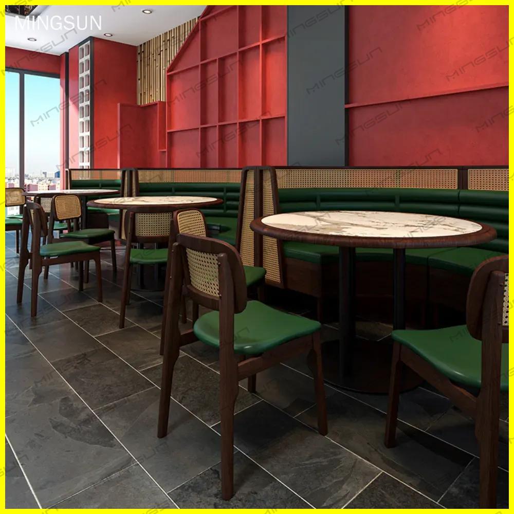 hotel-restaurant-interior-with-green-booths-and-marble-tables - MINGSUN