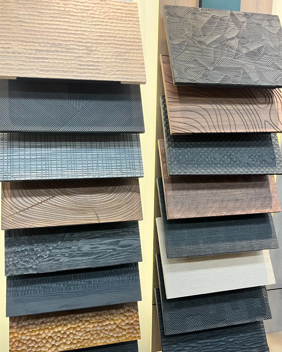 stacked-textured-laminate-panels-with-3d-wood-grain-and-geometric-patterns-for-hotels