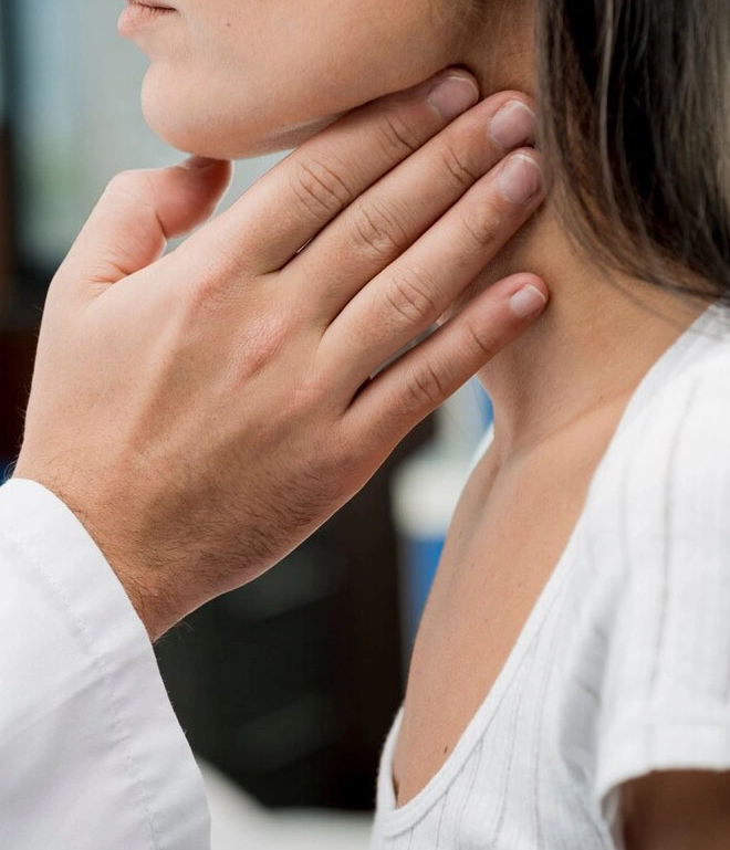 hand-touching-throat-patient