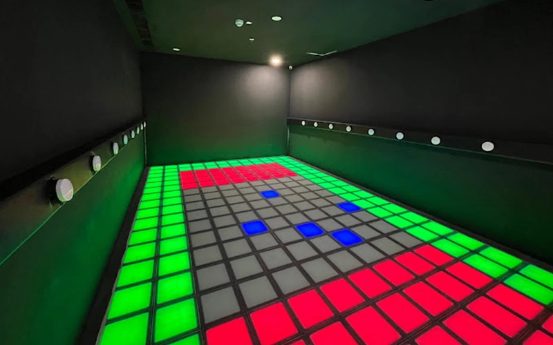 immersive game modes for pressure-sensitive LED floor tiles