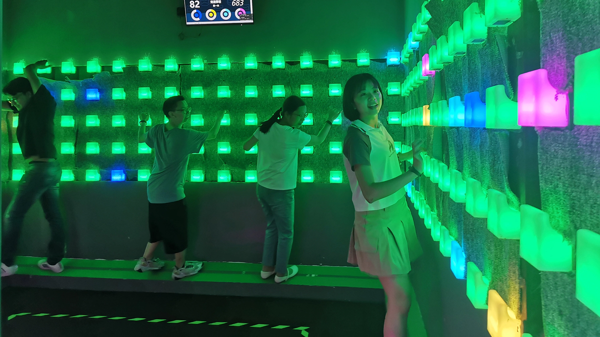 Turnkey LED wall tile climbing game room design for active entertainment venues
