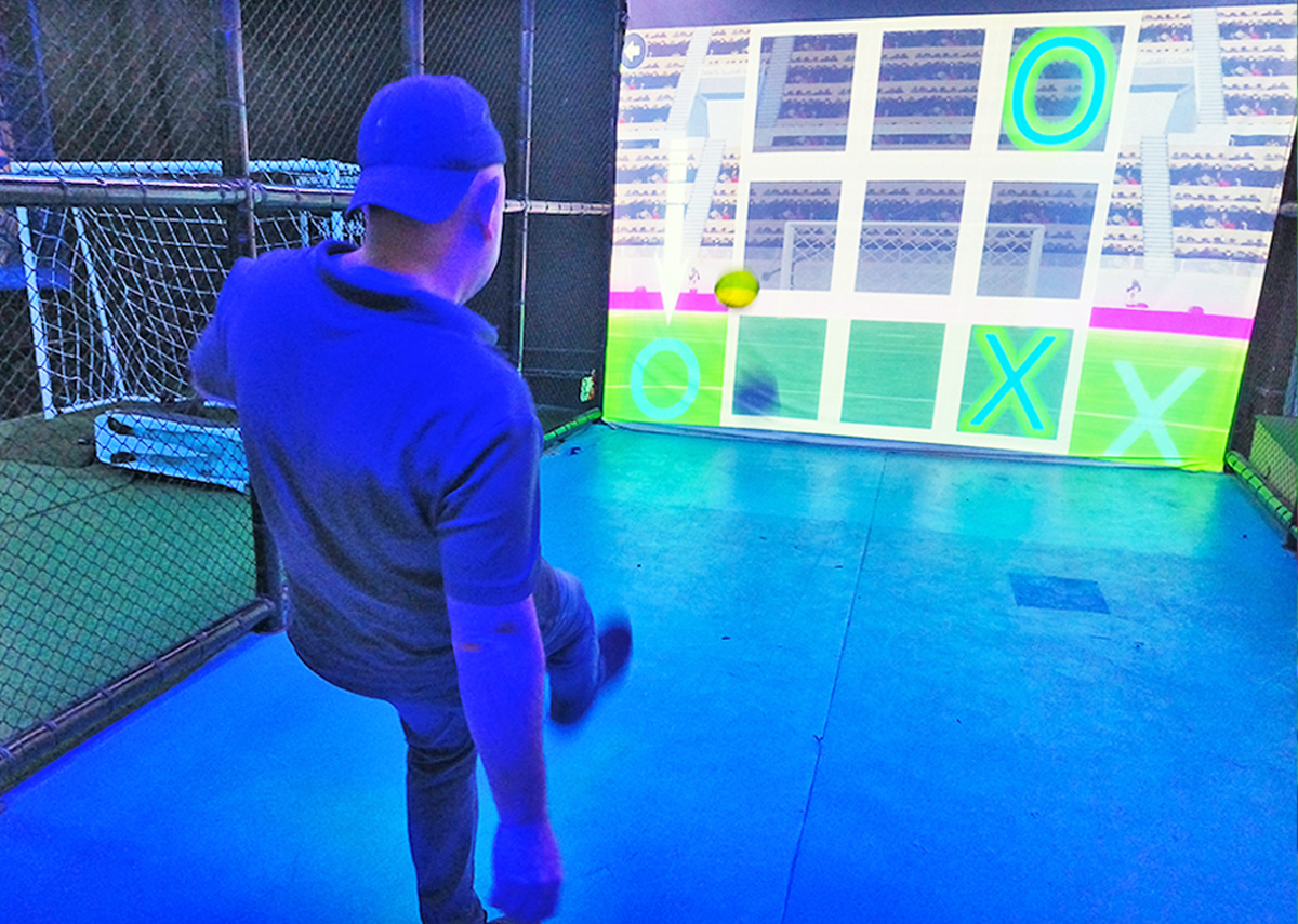interactive sensing between soccer simulators and wall projectors