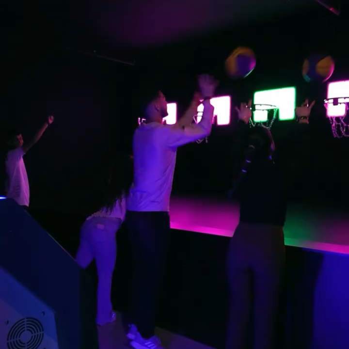 Interactive hoops game with LED basketball targets for active game rooms