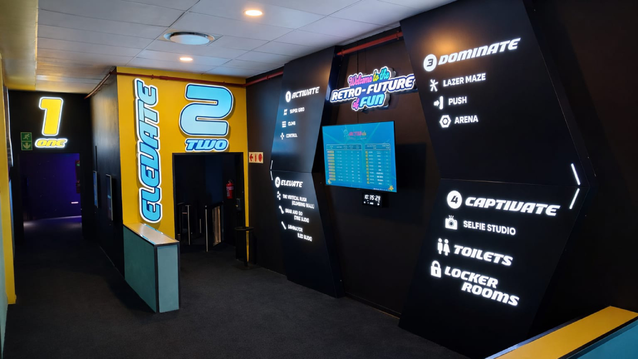 active-gaming-experience-in-family-entertainment-center-mossel-bay-south-africa Pixel grid LED floor game system for active challenge rooms with light-up floor tiles