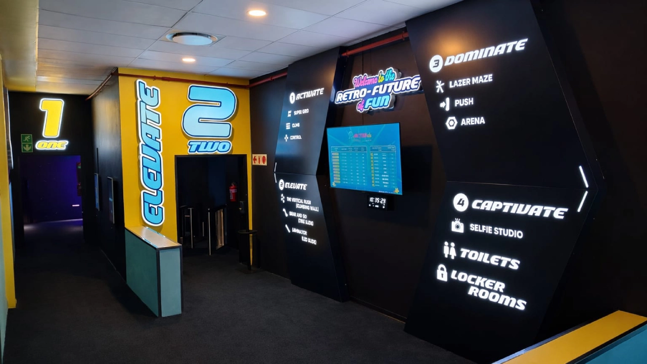 Pixel grid LED floor game system for active challenge rooms with light-up floor tiles