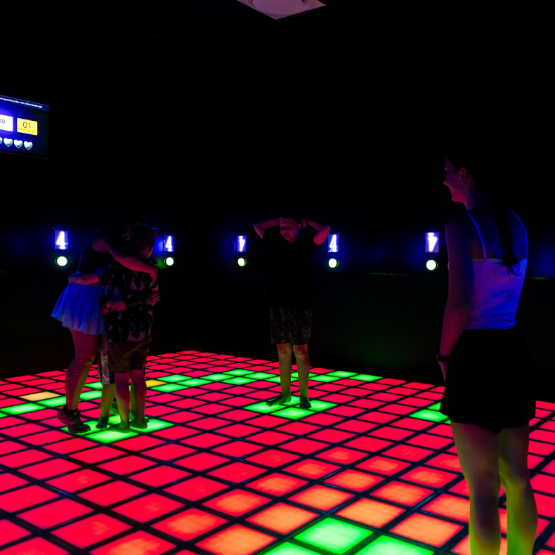Floor Is Lava LED floor game system with red light-up tiles for active game rooms