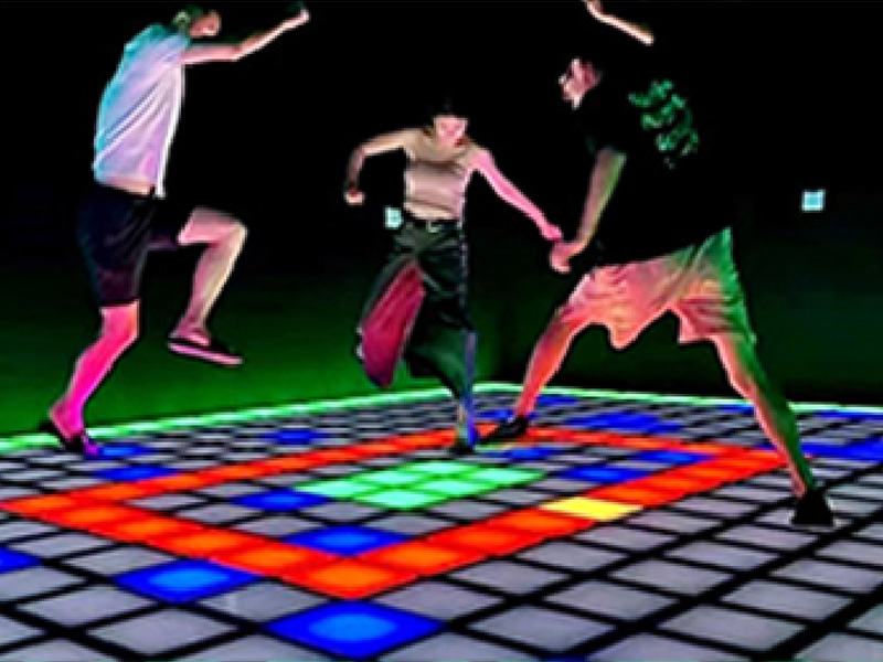 Floor is lava LED floor game with red and green light-up tiles