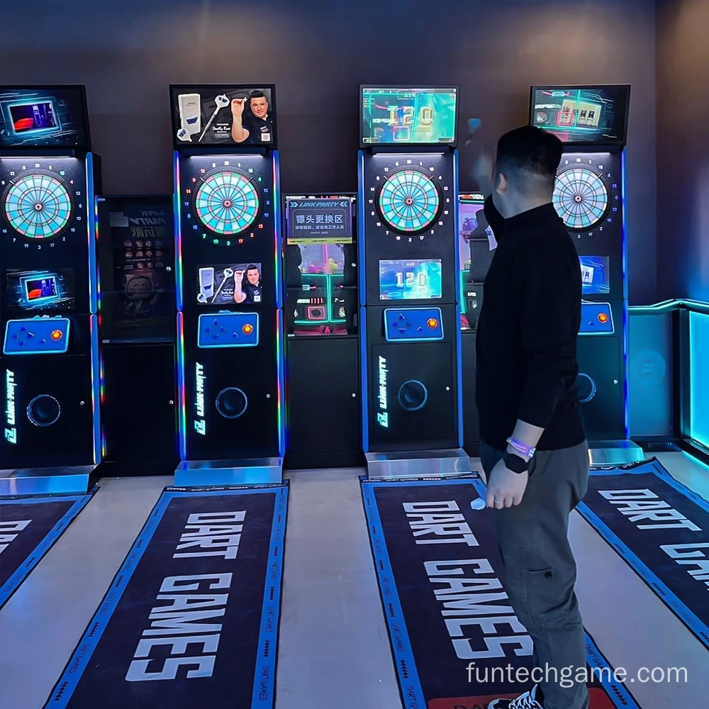 Person playing electronic darts in an arcade.