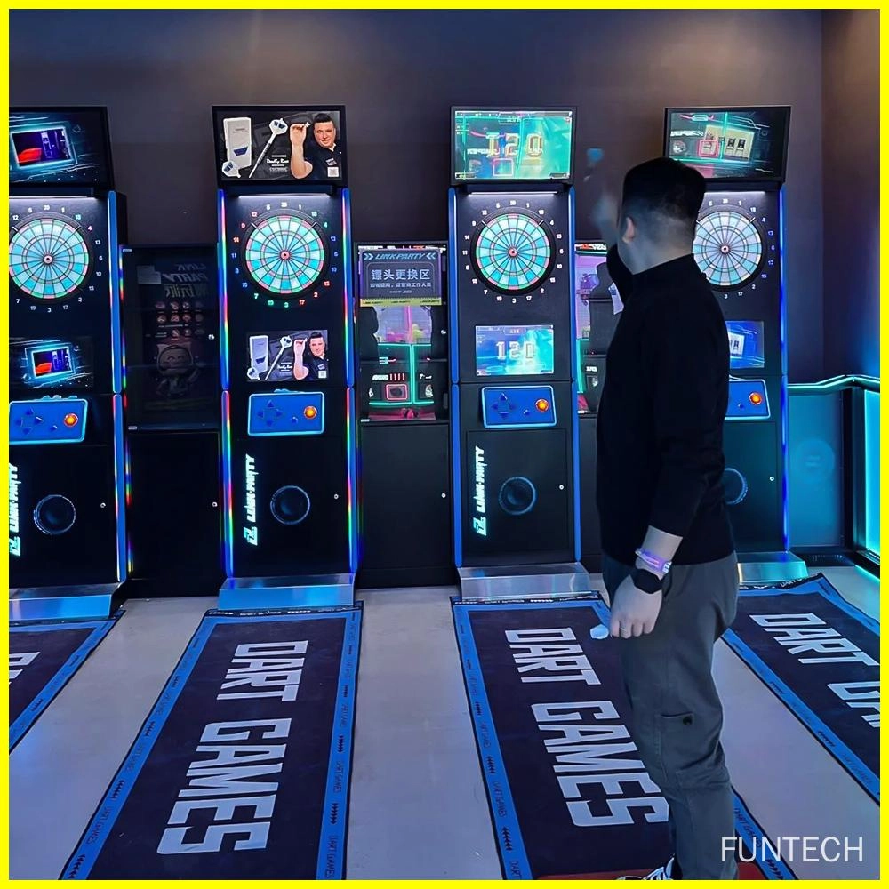 Person playing electronic darts in an arcade.