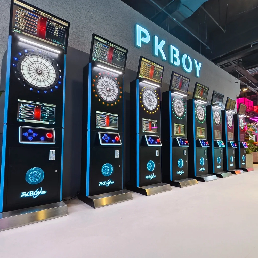 electronic dartboards with digital scoreboards in an arcade setting.