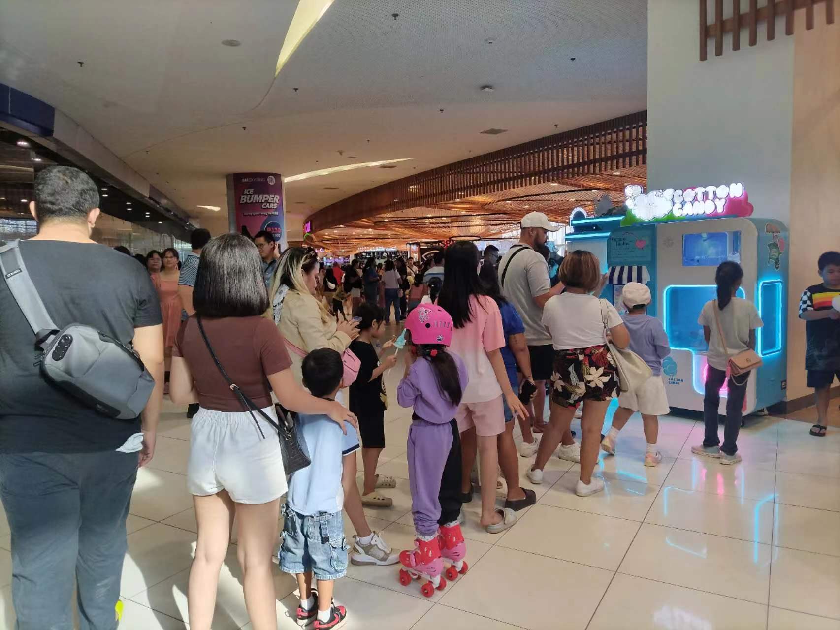 Mall Crowd at Cotton Candy Vending Machine