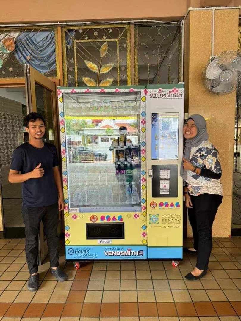 Buyers Signing for Vending Machine Delivery