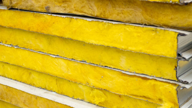 Stack of yellow wall heat insulation material.