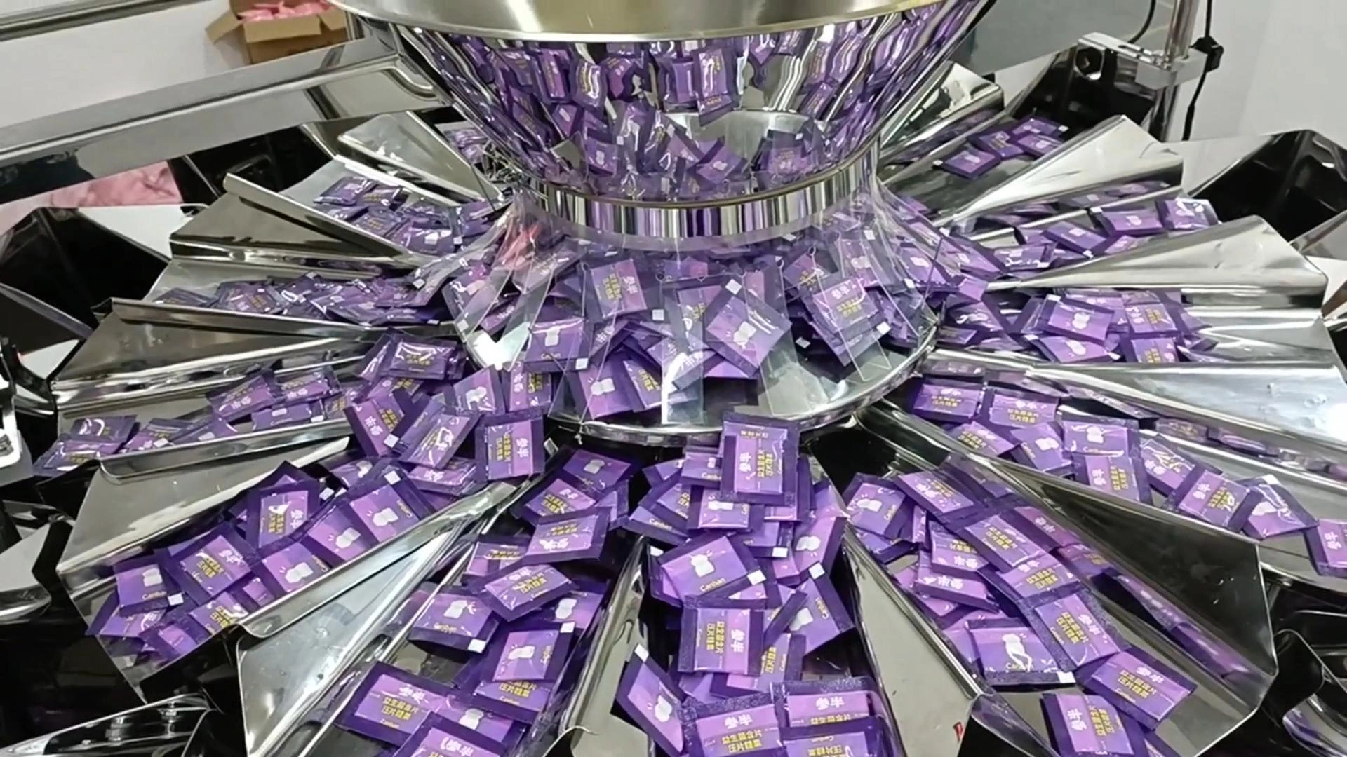 Integrated Multihead Weigher & VFFS Packing System for Small Bag Packaging - Kenwei