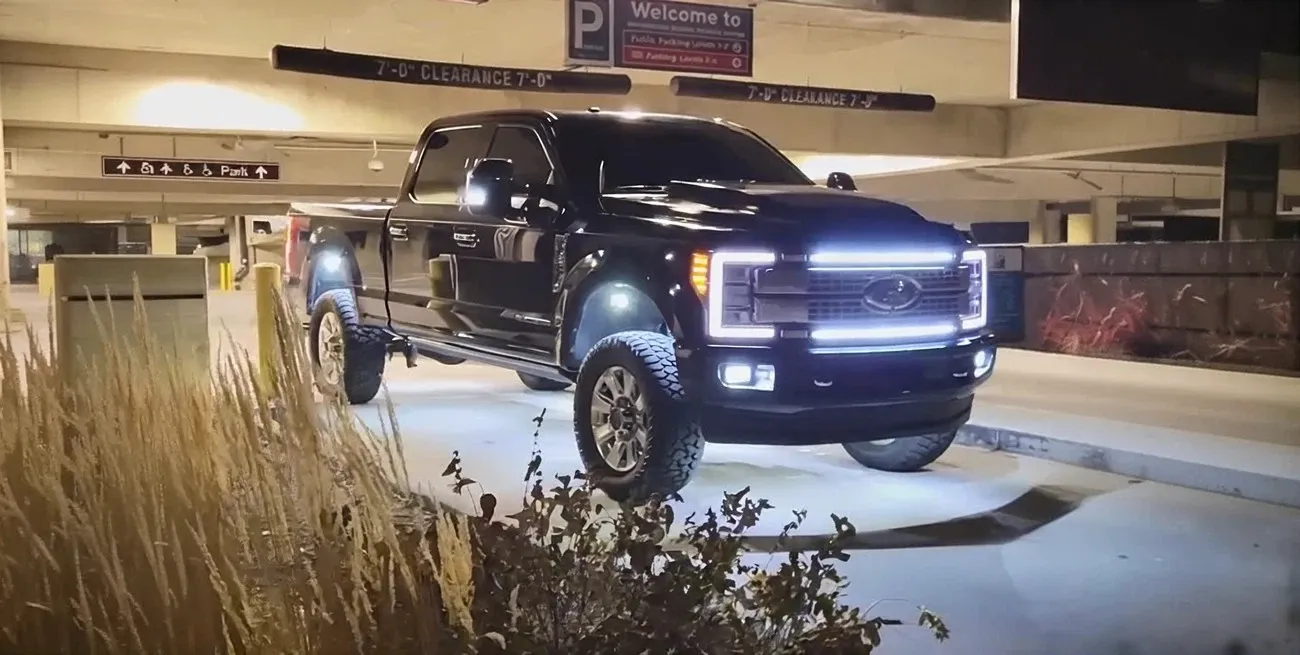 Black Ford Super Duty with Rock Lights