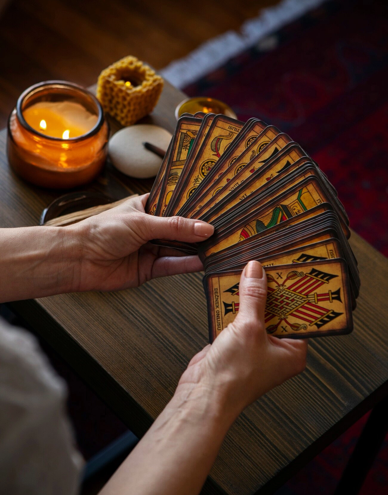 high-angle-woman-reading-tarot_23-2150396517