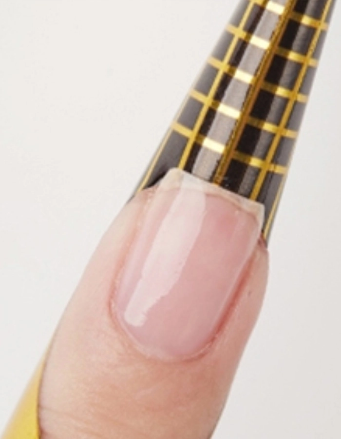 2.-After-applying-thebase-coat,-put-on-thenail-tray-and-adjustthe-position. 2. After applying thebase coat, put on thenail tray and adjustthe position.