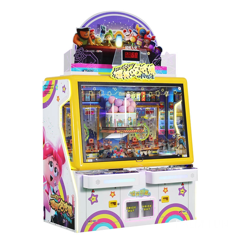 A yellow and white arcade game machine with a screen showing a colorful city with balls, stars, and a cartoon character singing. The machine has a prize out button.